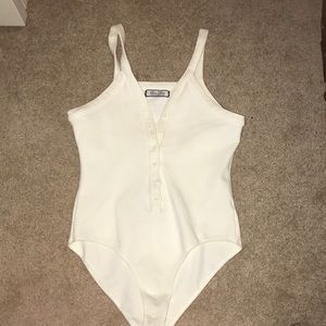 White bodysuit with buttons